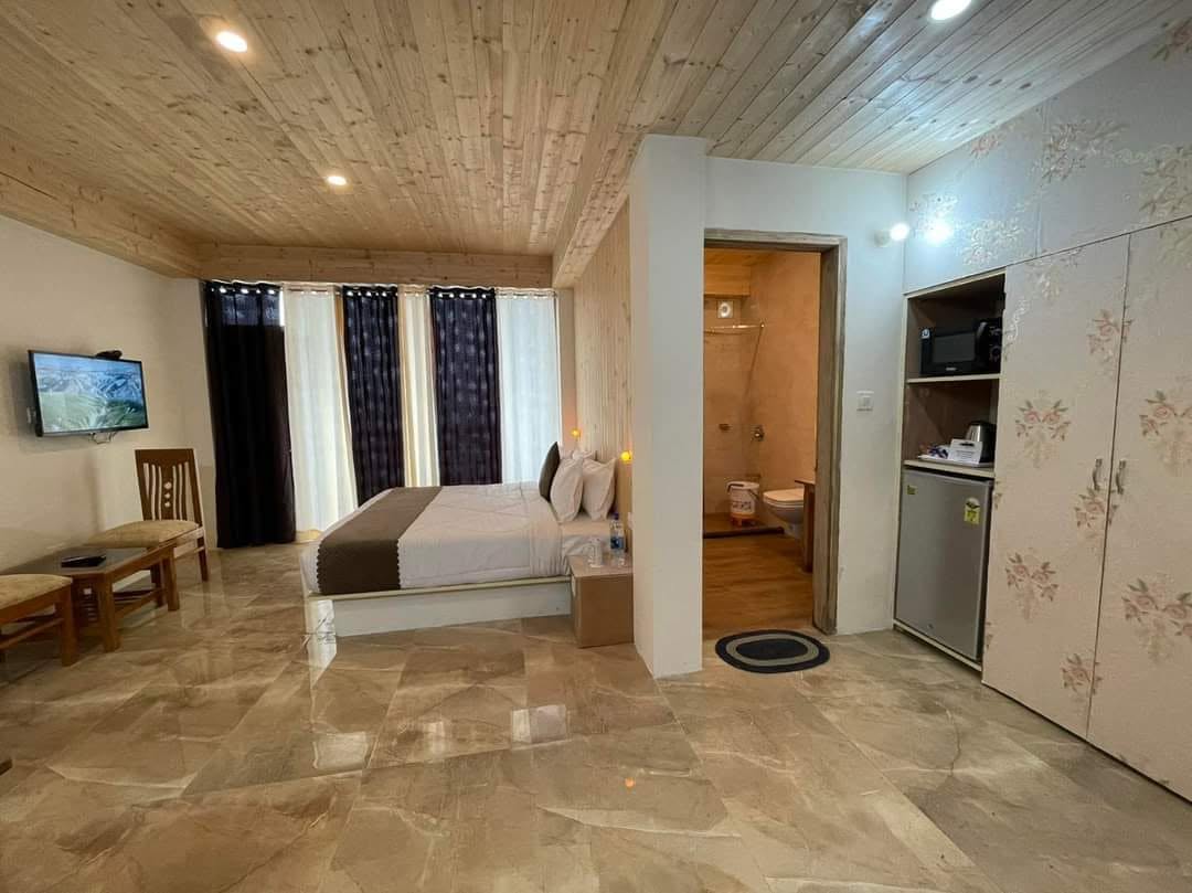 Anamika International Hotel room